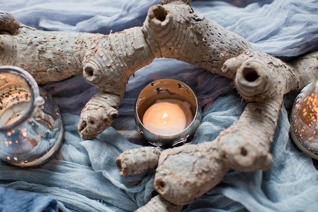 Photo table setting with candles and blue tissue