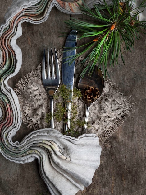 Table setting with christmas decorations top view