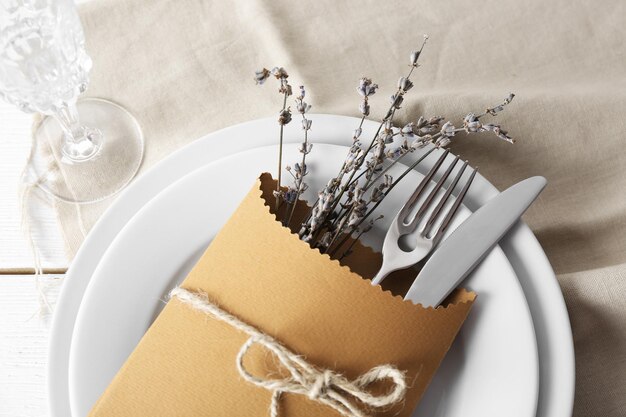 Table setting with lavender flowers closeup