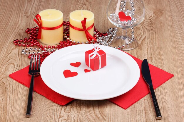 Table setting on wooden background