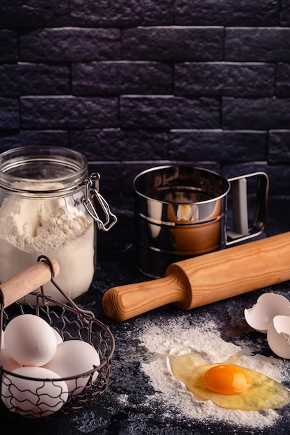 Table with baking products and tools Culinary baking concept