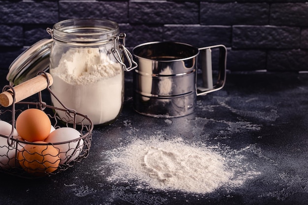 Table with baking products and tools