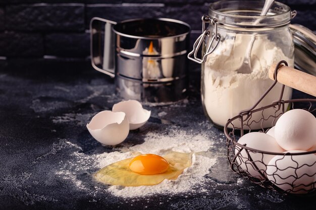 Table with baking products and tools