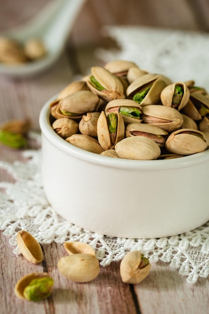 Table with a bowl of pistachios