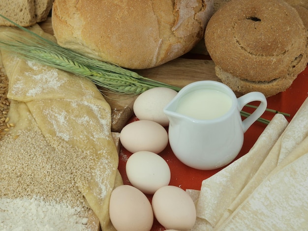 A table with bread, eggs, and bread