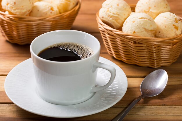 Table with cheese breads Cheese bread traditional Brazilian snack