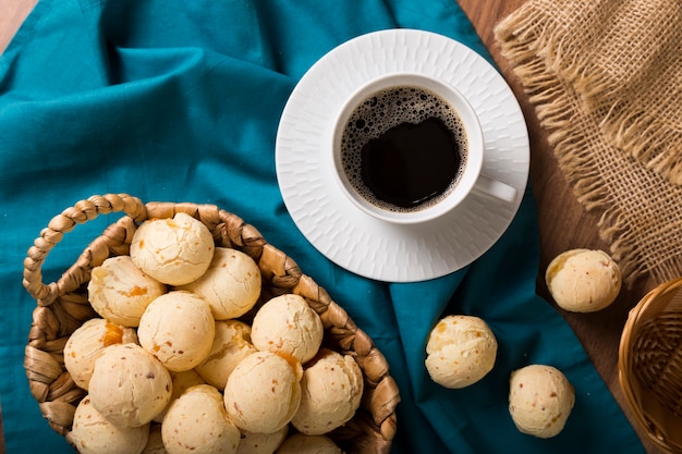 Table with cheese breads Cheese bread traditional Brazilian snack