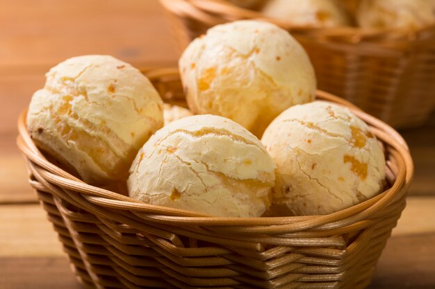 Table with cheese breads Cheese bread traditional Brazilian snack