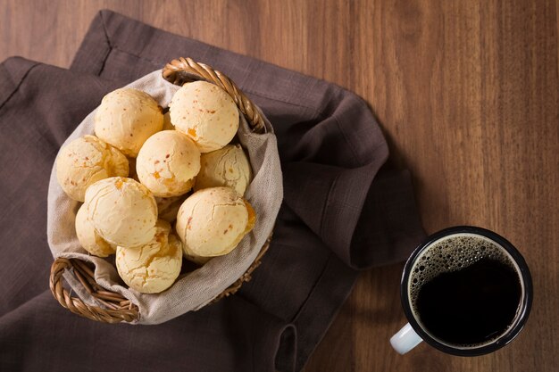 Table with cheese breads Cheese bread traditional Brazilian snack