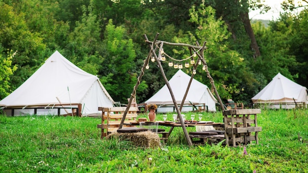 Table with food and drinks at glamping