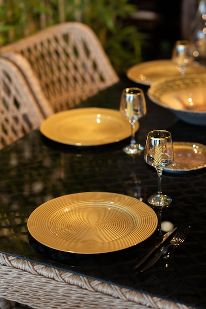 A table with a plate and glasses on it