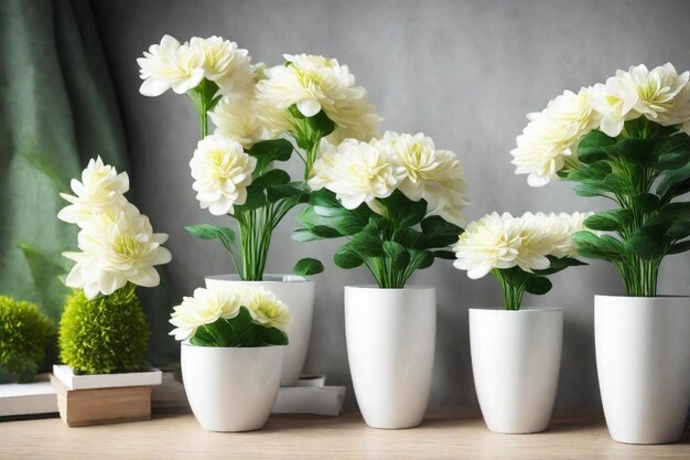 a table with three white vases with flowers on it and a green vase with the words quot flowers quot