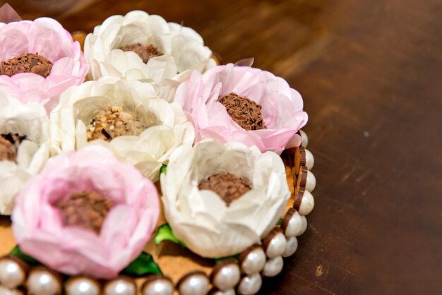 Table with traditional Brazilian party sweets. Chocolate, brigadeiro and condensed milk.