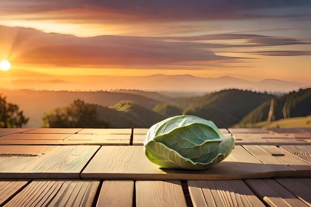 A table with a view of the mountains and a sunset in the background