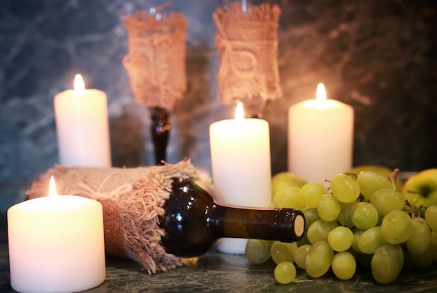 Table with wine bottle grape