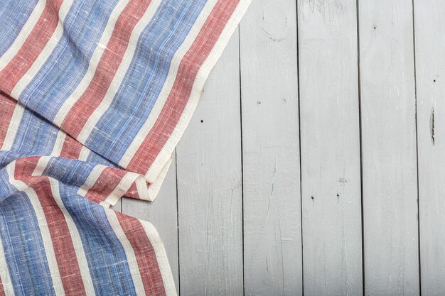 Tablecloth textile on wooden surface