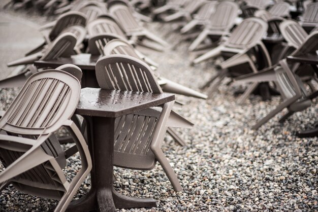 Tables and chairs of cafe on the beach