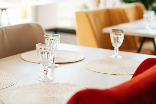 Tables in an empty cafe during pandemic No guests Served table