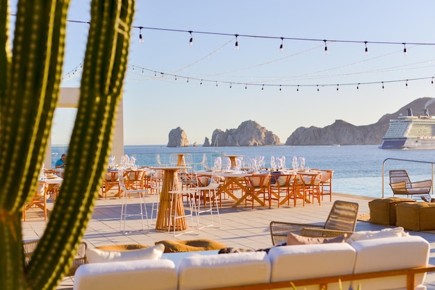 Tables set up for an event on the beach