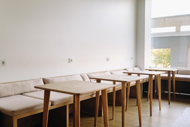 Tables standing in the interior Places to sit in a cafe