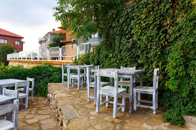 Tables for visitors in street cafe