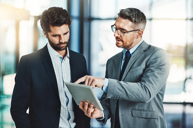 tablet coaching and mentor with business people meeting for networking communication and planning idea collaboration and corporate with employees in office for partnership teamwork or ceo review