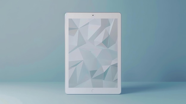 A tablet is placed on a blue table The tablet is turned off and has a white screen The background is a blue wall