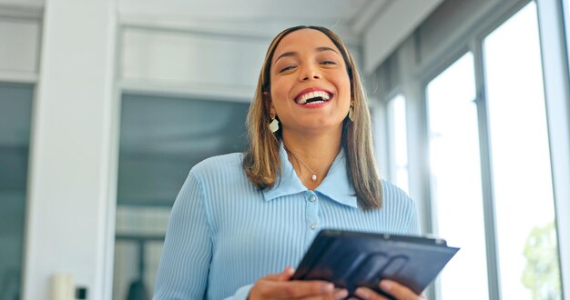 Tablet laugh and face of business woman in office for planning email and social media news Success motivation and idea with employee browsing on report for research internet and technology