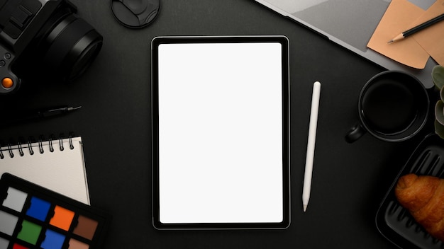 Premium Photo | Tablet mockup on a modern black workspace with ...