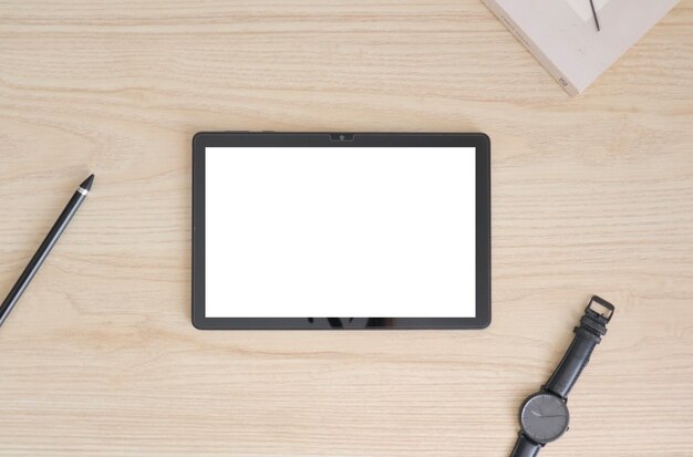 Premium Photo | Tablet on table top view