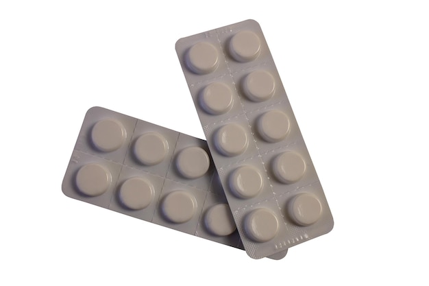 Tabletten geneesmiddelen gegraveerd op een witte achtergrond