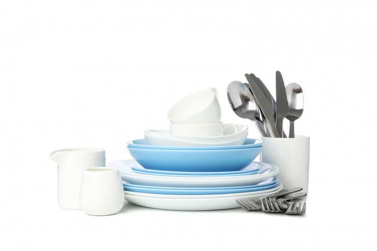 Photo tableware and cutlery isolated on white.