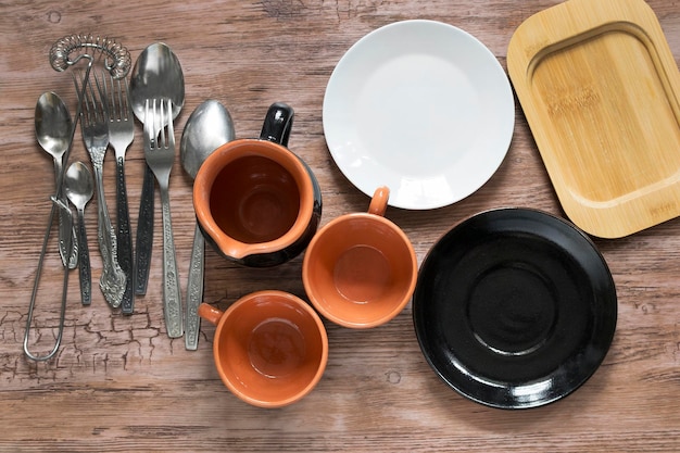 Tableware on wooden background