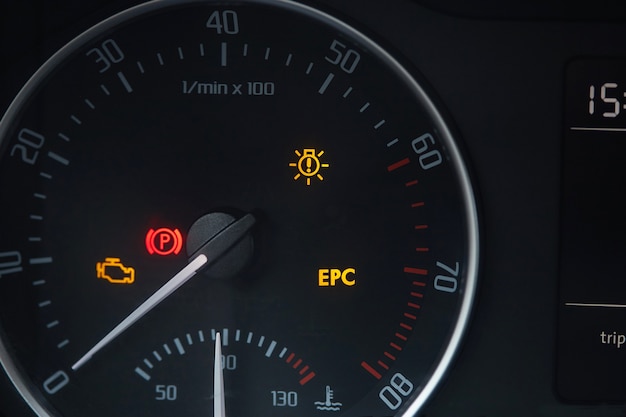 Tachometer dial with needle showing zero rpm with diagnostic\
icons isolated