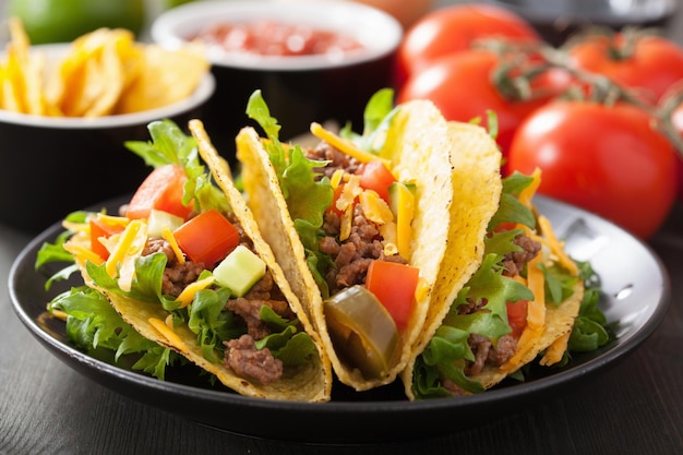 Taco shells with beef and vegetables