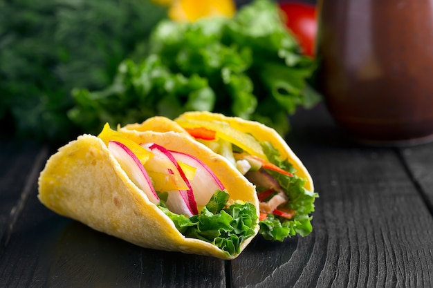 Taco with fresh vegetables 