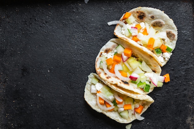 Tacos vegetable doner kebab flatbread taco on the table healthy\
food meal snack copy space food