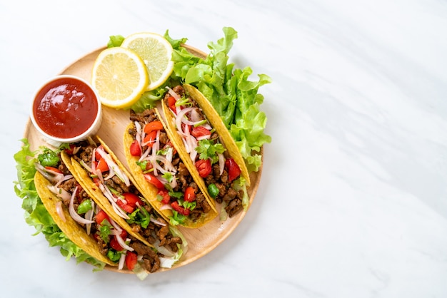 Photo tacos with meat and vegetables