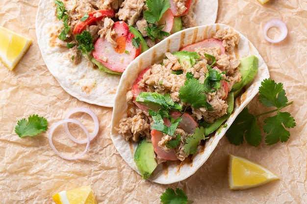 Tacos with plant based canned tuna and vegan crab