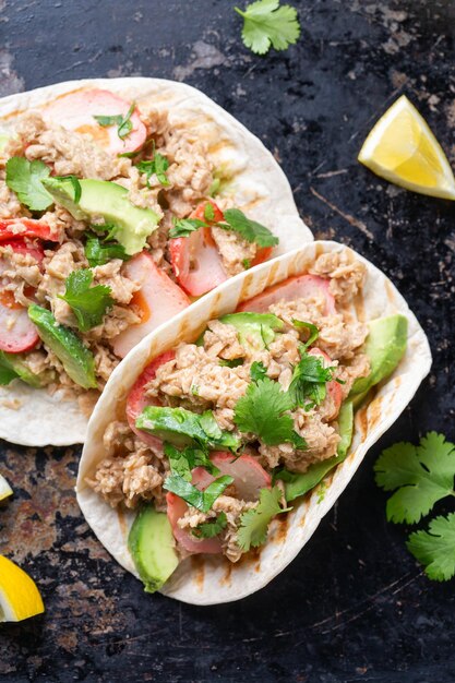 Tacos with plant based canned tuna and vegan crab