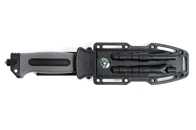 Photo tactical knife in sheath white background