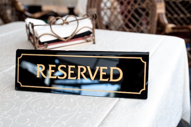 Tag of reservation placed on table