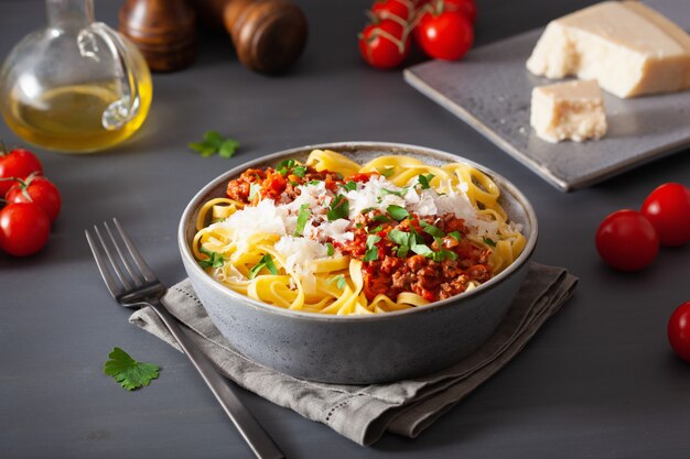 Tagliatelle bolognese with herbs and parmesan, italian pasta