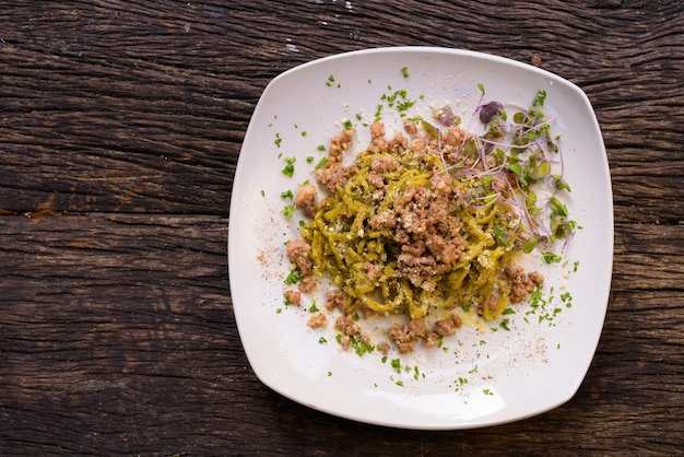 Tagliolini Pasta With Pesto and Sausage