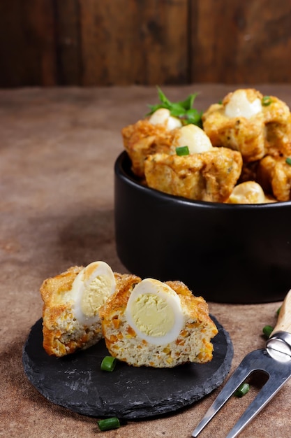 Photo tahu fantasi or tahu sarang burung is steamed tofu with quail eggs