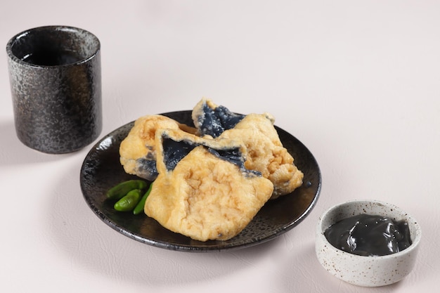 Tahu Petis is a Fried Tofu Filled with Petis or Shrimp Paste