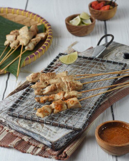 taichan  is a satay variant that contains grilled chickenand only served with chili sauce and lime