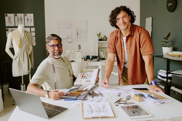 Tailor and Designer Posing for Photo
