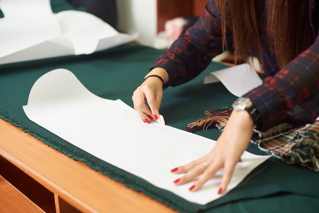 Tailor, designer workplace in atelier