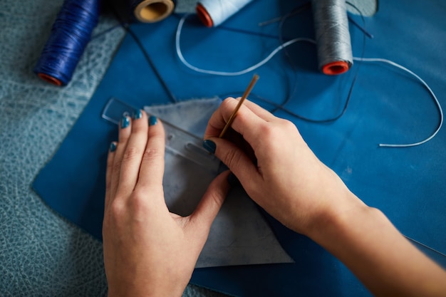 Tailor Sewing Leather Closeup